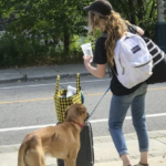 Lady with doggo and bag
