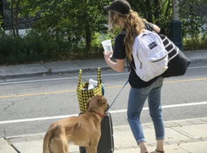 Lady with doggo and bag